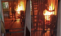 Cụ ông thản nhiên đốt vàng mã cháy ngùn ngụt dưới chân cầu thang chung cư