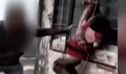 Phẫn nộ, bé trai bị cha treo người đánh bán sống bán chết