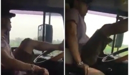 Tài xế xe tải buông 2 tay nhảy theo nhạc khi đang chạy đường cao tốc