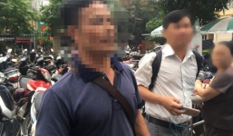 Nghe lén ghi âm xong, chồng túm tóc vợ kéo ra đường lột quần, đánh dập lá lách