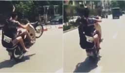 Cặp đôi 'tổ lái' bốc đầu xe máy trên phố Hà Nội
