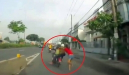 Cố túm áo đuổi theo tên trộm, cô gái bị kéo lê cả trăm mét trên quốc lộ