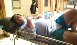 Nghi án nổ súng do tranh chấp đất, 2 cha con bị thương