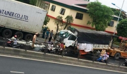 Tông vào đuôi xe container, phụ xe tải tử vong kẹt cứng trong cabin