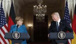 Bất đồng tại G7, ông Trump 'gượng gạo' giải hòa với bà Merkel bằng... kẹo dẻo