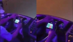 Clip: Tài xế vừa lái xe chở khách vừa xem... World Cup