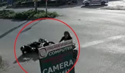 Bắc Ninh: Thanh niên mặc đồng phục bảo vệ chấp nhận ngã đau để tránh cô gái đi xe đạp điện sang đường