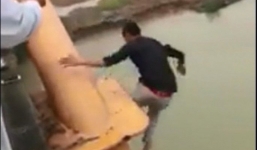 Gọi điện nói chuyện với bố xong, nam thanh niên nhảy cầu tự tử