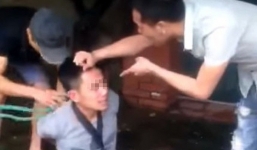 Hai người đàn ông trói tay, hành hung nam thanh niên giữa phố Hà Nội vì nghi trộm xe