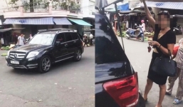 Bị nhắc vì đỗ xế sang giữa ngã ba rồi mua đồ, nữ tài xế thách người quay tung clip lên Facebook