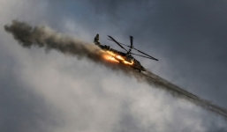 24h qua ảnh: Máy bay trực thăng Nga trình diễn phóng tên lửa