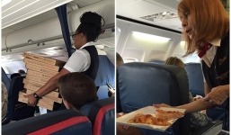 Trễ chuyến bay vì bão, phi công mua pizza mời hàng trăm hành khách