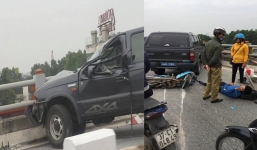 Ô tô biển xanh chạy tốc độ cao tông 2 xe máy trên cầu Thanh Trì