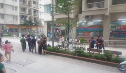 Hé lộ danh tính gã chồng rút súng bắn vợ giữa chung cư Hà Nội