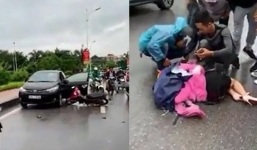 Tài xế ô tô mở cửa bất cẩn khiến người đi xe máy ngã văng xuống đường