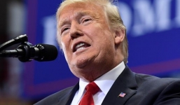 Trump bất ngờ đe dọa nổ súng với di dân ném đá vào quân đội