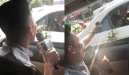 Thanh niên đuổi theo xe hoa hát bài 'Vợ người ta' khiến cô dâu chú rể ngượng chín mặt