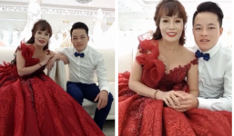 Hưởng tuần trăng mật ở Đà Nẵng đúng đợt mưa bão, vợ chồng 'cô dâu 62 tuổi' tranh thủ chụp thêm bộ ảnh cưới làm kỉ niệm