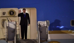 Những hình ảnh đầu tiên của Tổng thống Donald Trump khi tới Việt Nam
