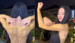 Video: Angela Phương Trinh cạo hạt đính trên người như đánh vảy cá khiến người xem rùng mình 
