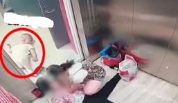 Bà mẹ bỏ con 6 tháng nằm khóc ngoài thang máy, lao vào làm điều ai cũng phải kinh ngạc