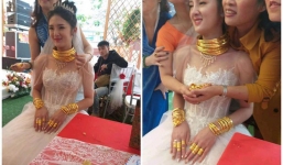 Danh tính cô dâu Cao Bằng đeo vàng trĩu cổ khiến dân mạng xôn xao