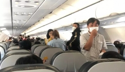 TP HCM mưa lớn khiến máy bay không thể hạ cánh, phải quay đầu ra Cam Ranh