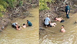 Video: Cảm phục trước cảnh người đàn ông đuối sức khi cứu một phụ nữ nhảy sông