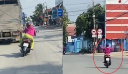 Video: Đang chạy xe máy thì bị 'cua-rơ nhập', nữ tài xế khiến người đi đường thất kinh