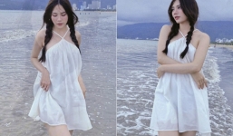 Hoa hậu Mai Phương thả dáng hờ hững trước biển, góc nghiêng xuất sắc khiến fan giật mình tưởng Thuỳ Tiên