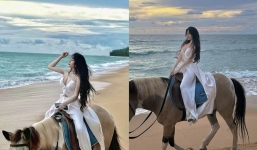 Gái xinh bị lấy ảnh minh hoạ cho 'tour 7.000 USD' gây ấn tượng khi đu trend cưỡi ngựa đi dạo biển