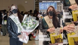 Tân Hoa hậu Trái đất về nước vương miện đựng trong túi giấy, người xung quanh thờ ơ 