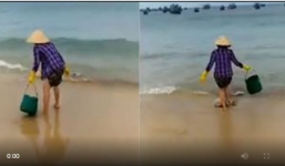 Xôn xao clip hai cô gái thản nhiên đổ ra xuống sông mặc người qua đường nhắc nhở