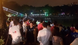 Hàng trăm người dân hiếu kỳ đổ xô ra xem cảnh trục vớt 'xế hộp' lao xuống hồ Linh Đàm