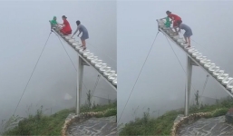 Em bé ngồi vắt vẻo trên đỉnh nấc thang lên thiên đường ở Ô Quy Hồ khiến nhiều người thót tim