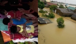 Nước lũ dâng cao ngập sát trần nhà ở Quảng Bình, nhiều người dân lên mạng cầu cứu