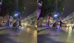 Đôi nam nữ cãi nhau giữa đường, chiếc xe máy bỗng trở thành 'nạn nhân' bất đắc dĩ