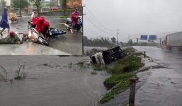 Bão số 12 quật đổ xe máy người đi đường, ô tô tải bị lật do gió lớn