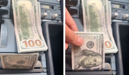 Clip máy bay tự động nhả tiền để trả lương cho phi công sau khi hạ cánh gây tranh cãi