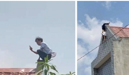 Nam thanh niên leo lên nóc nhà la hét 'tìm sóng điện thoại', rồi bất ngờ nhảy xuống bên dưới