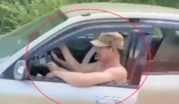 Xử phạt cặp vợ chồng trong clip ngồi chung ghế lái ô tô lao vun vút trên đường 