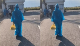 Nữ nhân viên y tế như 'bơi' trong bộ đồ bảo hộ khiến dân tình vừa thương vừa buồn cười