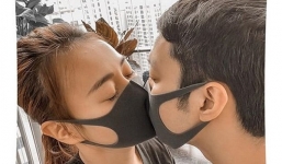 Phương Oanh bịt khẩu trang kín mít hôn bạn trai giấu mặt