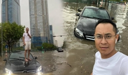 Sự thật về bức ảnh người đàn ông ngồi trên nắp capo Mercedes chụp ảnh giữa biển nước tại Hà Nội