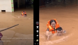 Xúc động những hình ảnh được giải cứu, hỗ trợ trong nước lũ miền Trung