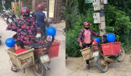 Hình ảnh bà chở cháu đi khai giảng bằng sọt xe chở phế liệu khiến ai cũng nhói lòng
