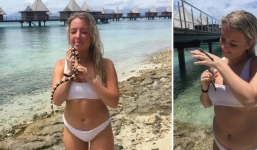 Rùng mình thấy cô gái vô tư âu yếm sinh vật độc gấp 10 lần rắn đuôi chuông trên bãi biển