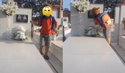 Hình ảnh cậu bé đi học về, chạy ra mộ hôn lên di ảnh mẹ khiến nhiều người nghẹn ngào