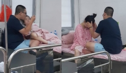 Anh chàng chiều vợ đẻ hết mực, xoa đầu đút từng thìa cháo cho vợ ăn