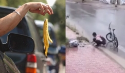 Cậu bé móc rác khơi cống giữa trời mưa: Hành động nhỏ nhưng tính lan truyền lớn